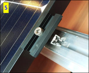 Delmonterad mittklämma