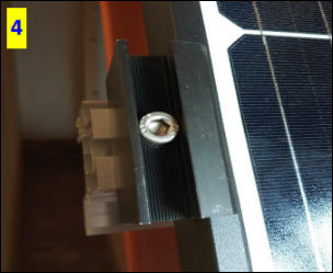 Monterad ändklämma